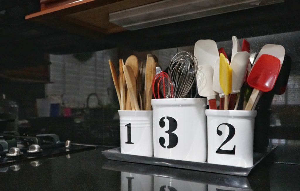 crock storage for wooden spoons whisks spatulas